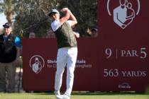 Rickie Fowler watches his drive from the ninth tee box during the first round of the Shriners H ...