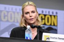 Charlize Theron speaks at the "Women Who Kick Ass" panel on day three of Comic-Con In ...