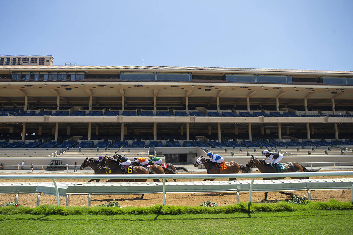 In this image provided by Benoit Photo, Secret Touch, left, with Umberto Rispoli aboard, wins t ...