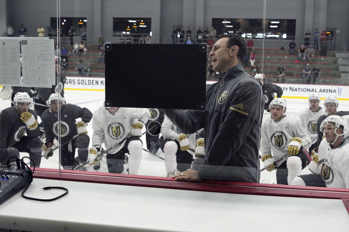 The Chicago Wolfs' coach Rocky Thompson lays out a practice plan for the Vegas Golden Knights d ...