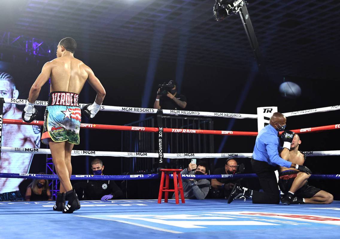 Felix Verdejo heads to his corner after knocking out Will Madera in the first round of their li ...
