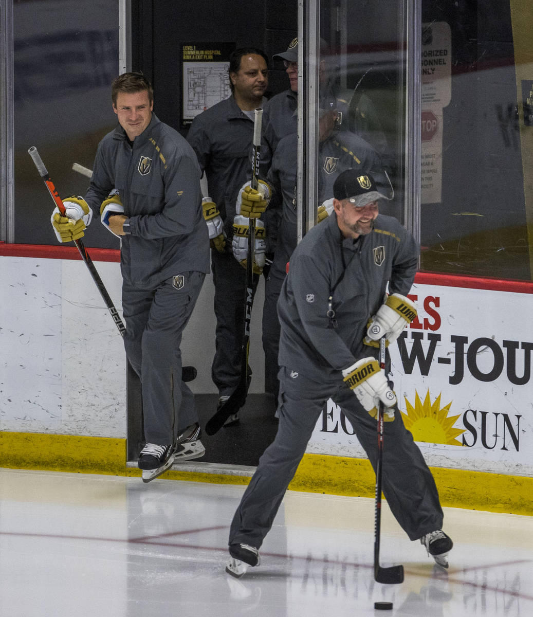 Vegas Golden Knights head coach Peter DeBoer leads out his assistant coaches onto the ice durin ...