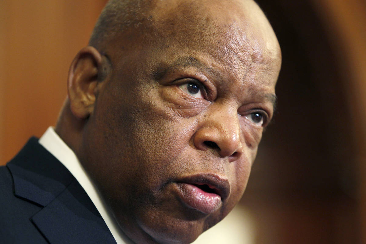 FILE - This June 16, 2010 file photo, Rep. John Lewis, D-Ga., participates in a ceremony to unv ...