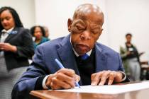 Congressman John Lewis signs paperwork to qualify for reelection to his District 5 seat in Atla ...