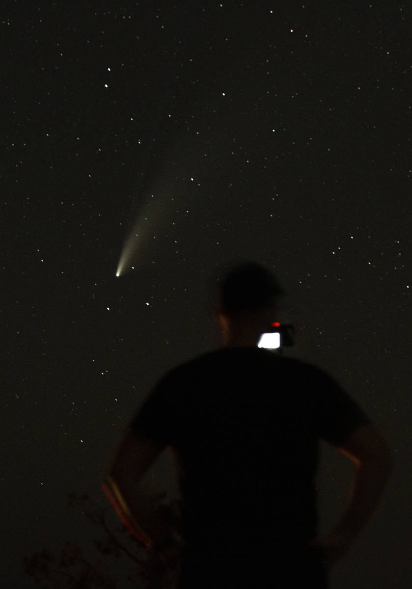 David Ray of Las Vegas makes a long exposure image of the NEOWISE comet on Saturday, July 18, 2 ...