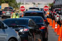 People line up for a coronavirus testing site at Texas Station in Las Vegas on Thursday, July 1 ...