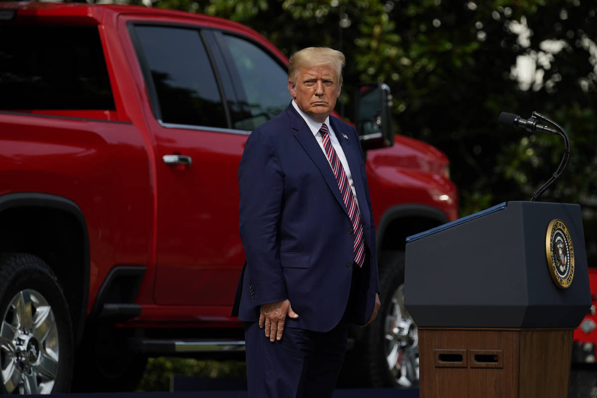 President Donald Trump pauses as he speaks during an event on regulatory reform on the South La ...