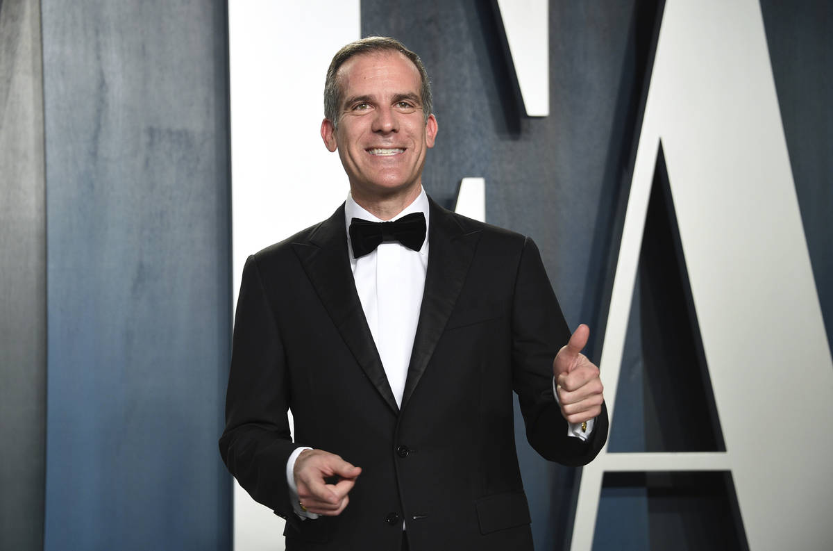 Eric Garcetti arrives at the Vanity Fair Oscar Party on Sunday, Feb. 9, 2020, in Beverly Hills, ...