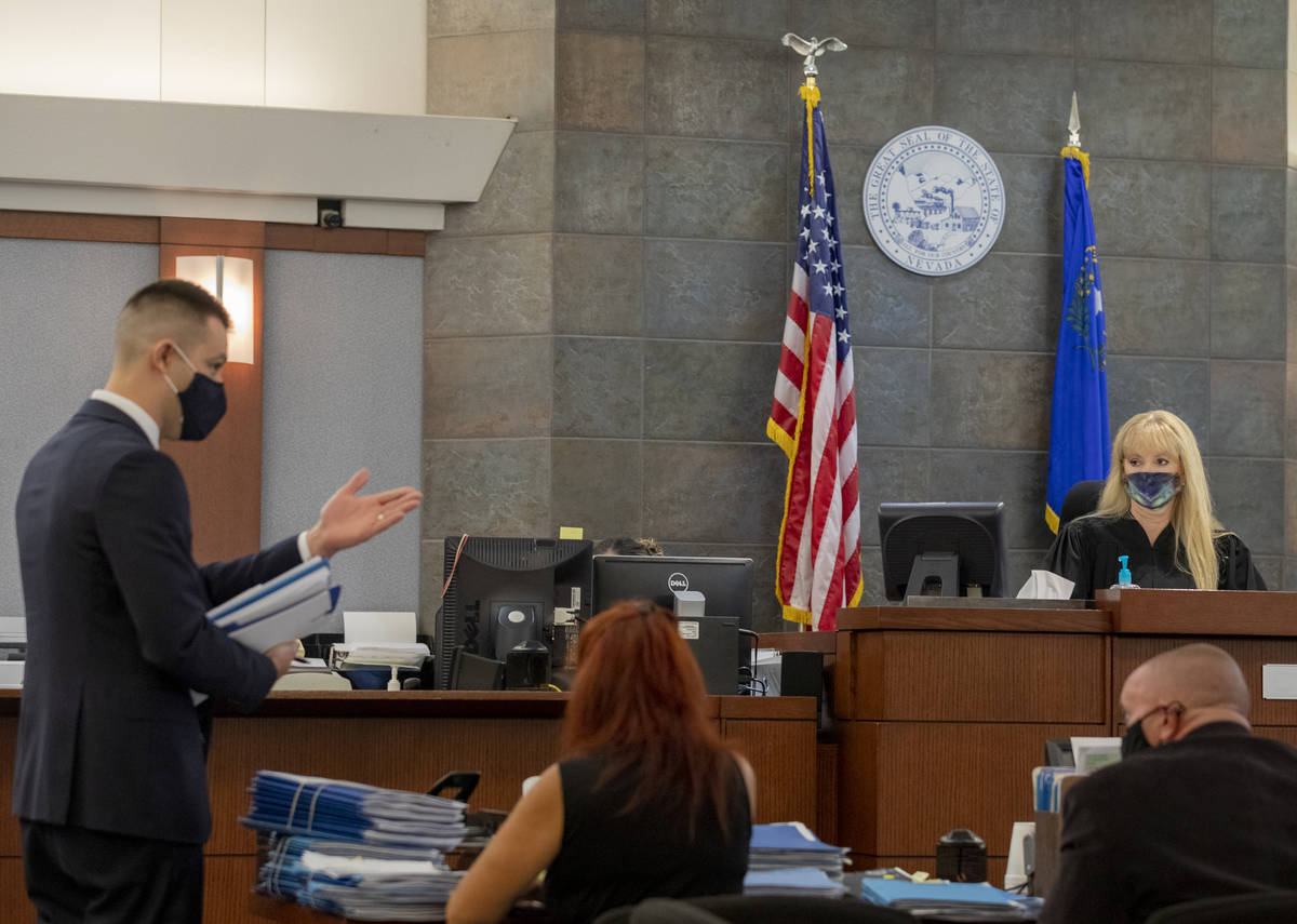Prosecutor Frank LoGrippo speaks with Las Vegas Justice of the Peace Suzan Baucum during a bail ...