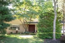 Crime scene tape surrounds the home of U.S. District Judge Esther Salas on Monday, July 20, 202 ...