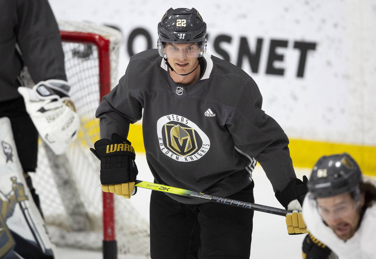 Golden Knights' defenseman Nick Holden (22) eyes the puck during practice at City Capital Arena ...