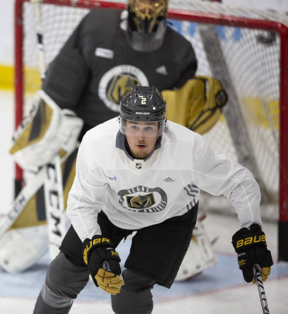 Golden Knights' defenseman Zach Whitecloud (2) skates toward the action during practice at City ...