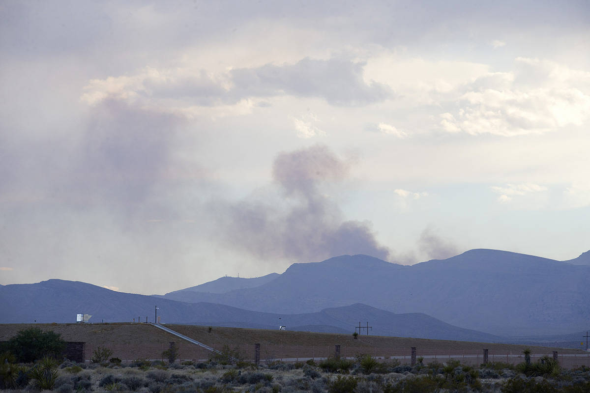 Smoke from the Cottonwood Fire peaks behind Mt. Potosi on Monday, July 20, 2020, in Las Vegas. ...