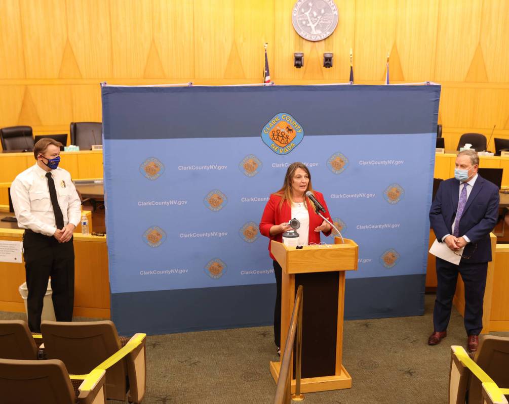 Clark County Commission Chairman Marilyn Kirkpatrick, flanked by Clark County Fire Chief John S ...