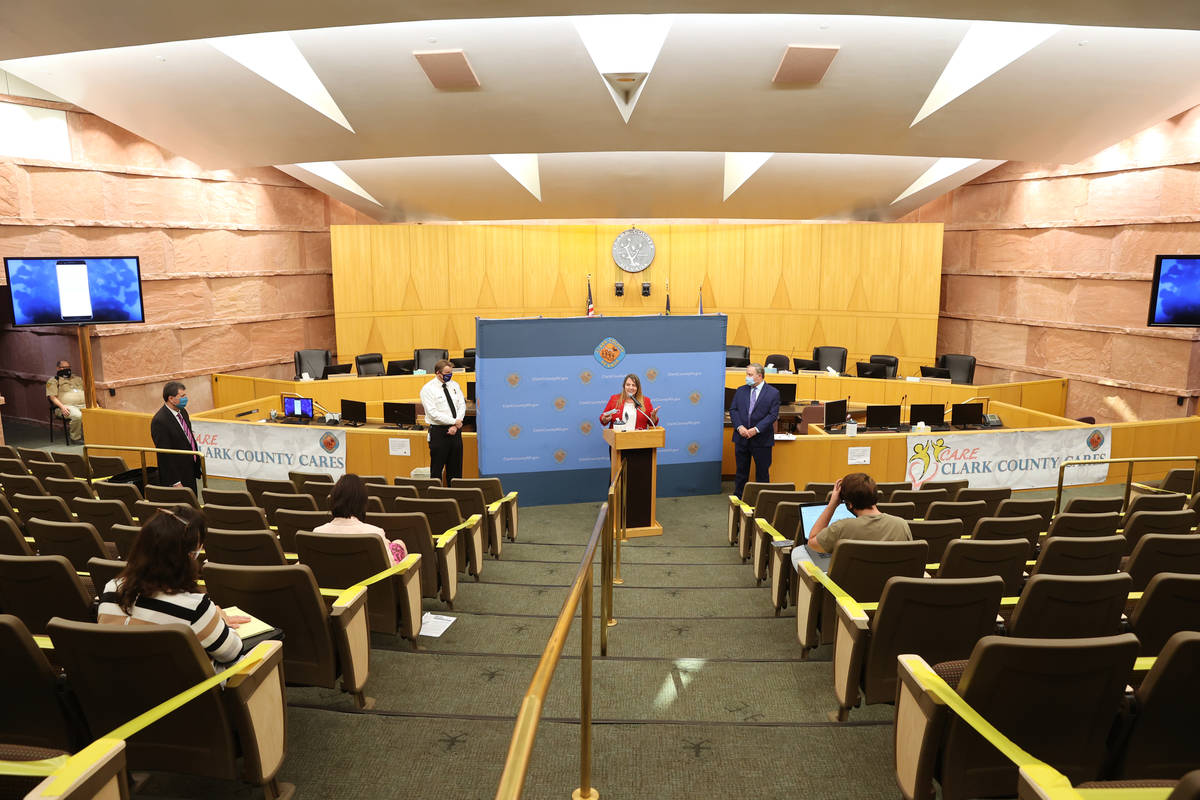 Clark County Commission Chairman Marilyn Kirkpatrick, flanked by Clark County Fire Chief John S ...