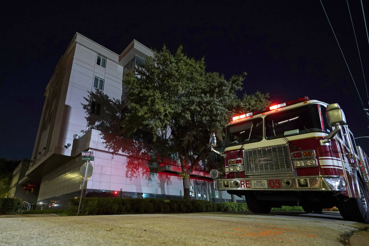 A firetruck is positioned outside the Chinese Consulate Wednesday, July 22, 2020, in Houston. A ...