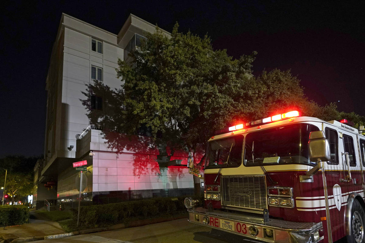 A firetruck is positioned outside the Chinese Consulate Wednesday, July 22, 2020, in Houston. A ...