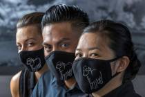 Jamie Tran, right, with Jesus Ramirez, center, and Jamie Clark from The Black Sheep wearing cus ...