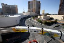 Las Vegas Monorail trains pass the under-construction MSG Sphere performance venue in Las Vegas ...