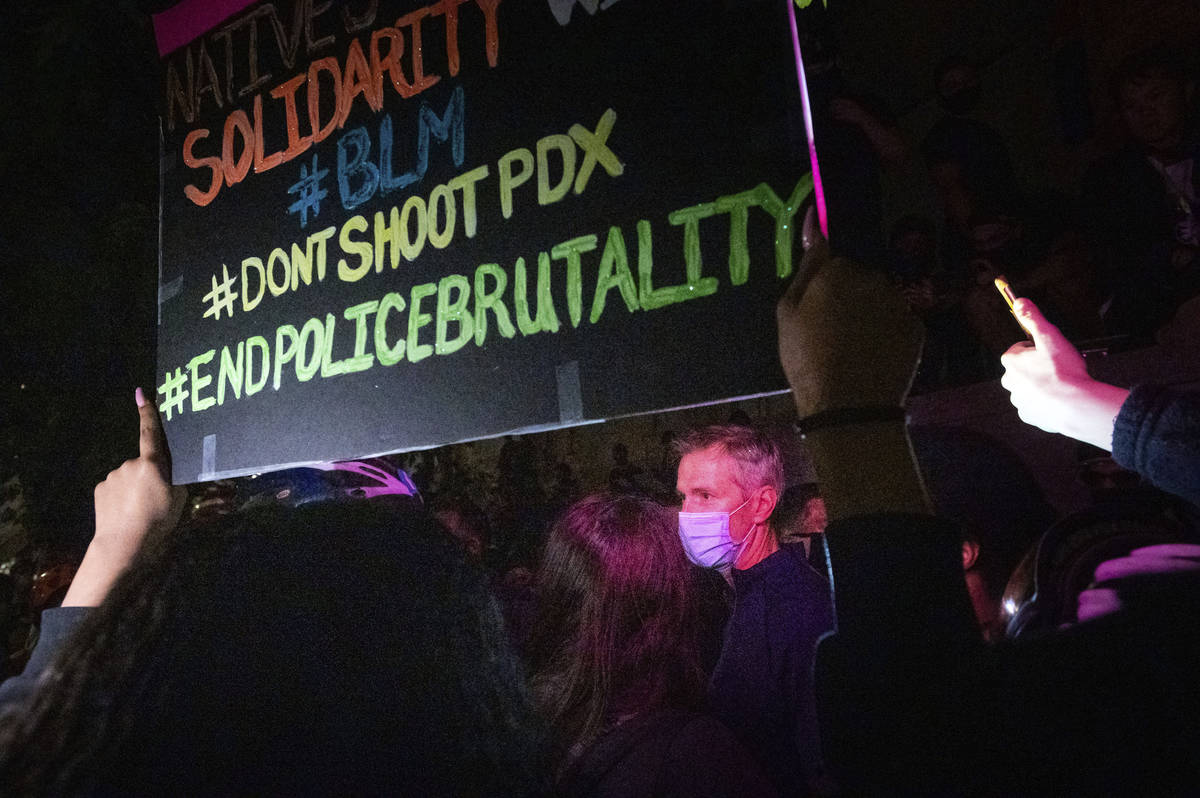 Portland Mayor Ted Wheeler speaks with Black Lives Matter protesters on Wednesday, July 22, 202 ...