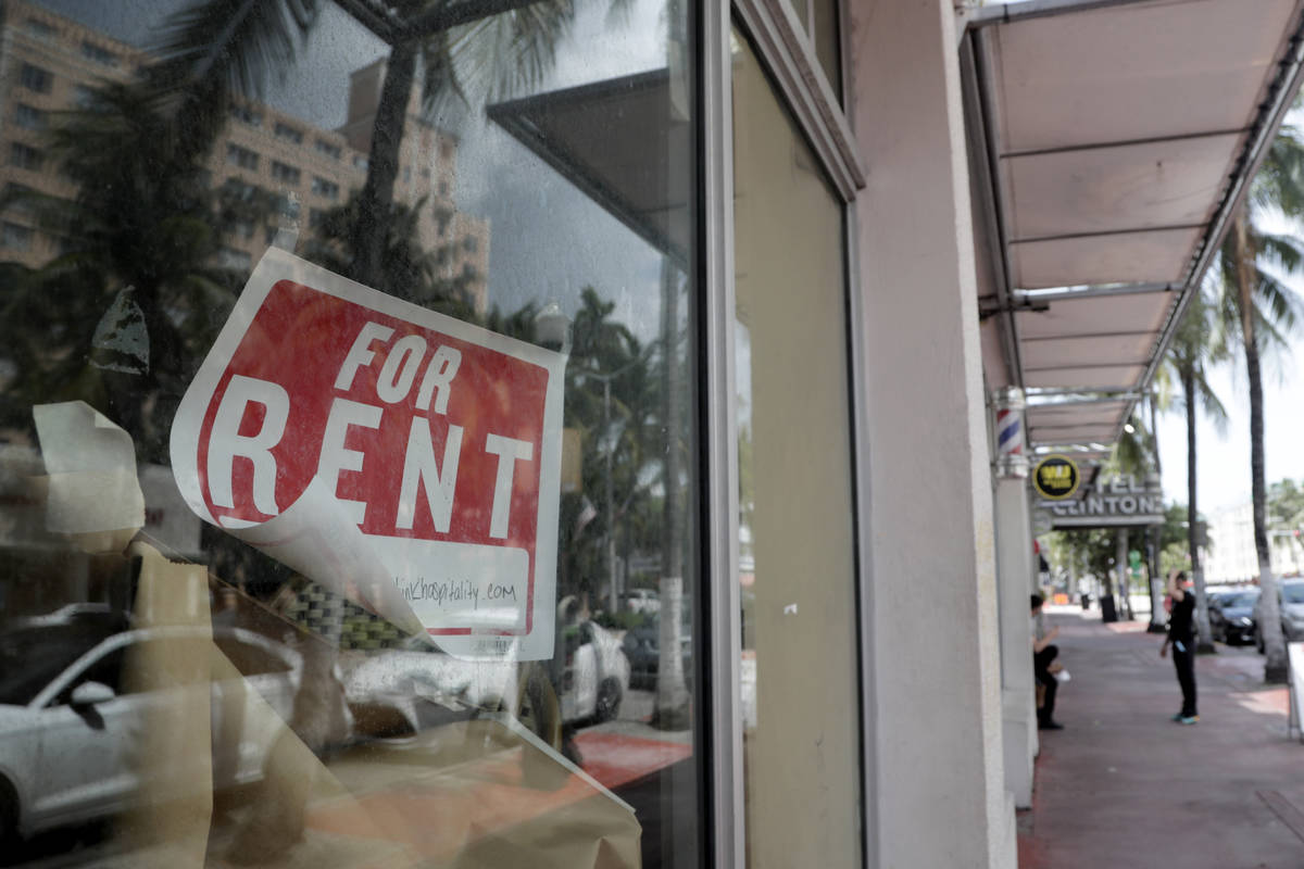 In this July 13, 2020, file photo a For Rent sign hangs on a closed shop during the coronavirus ...