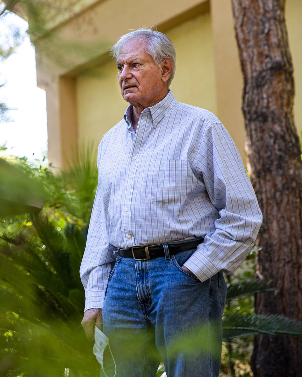 Photographer Dave Cherkis poses for a portrait by the Rampart Casino at the Resort at Summerlin ...