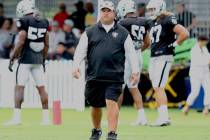 Oakland Raiders defensive coordinator Paul Guenther oversees the defensive drills at the team's ...