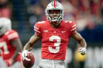 FILE - In this Dec. 1, 2018, file photo, Ohio State cornerback Damon Arnette (3) celebrates aft ...