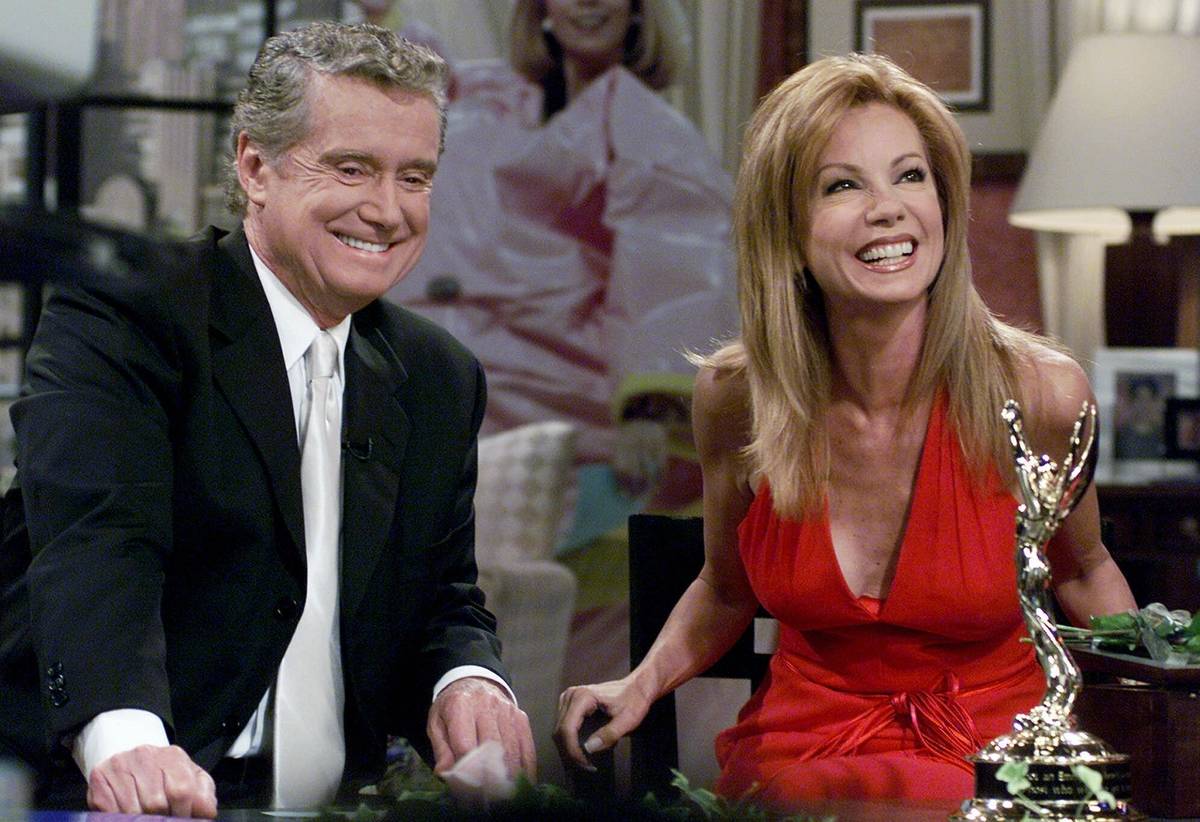 FILE - In this July 28, 2000 file photo, Kathie Lee Gifford and co-host Regis Philbin reminisce ...
