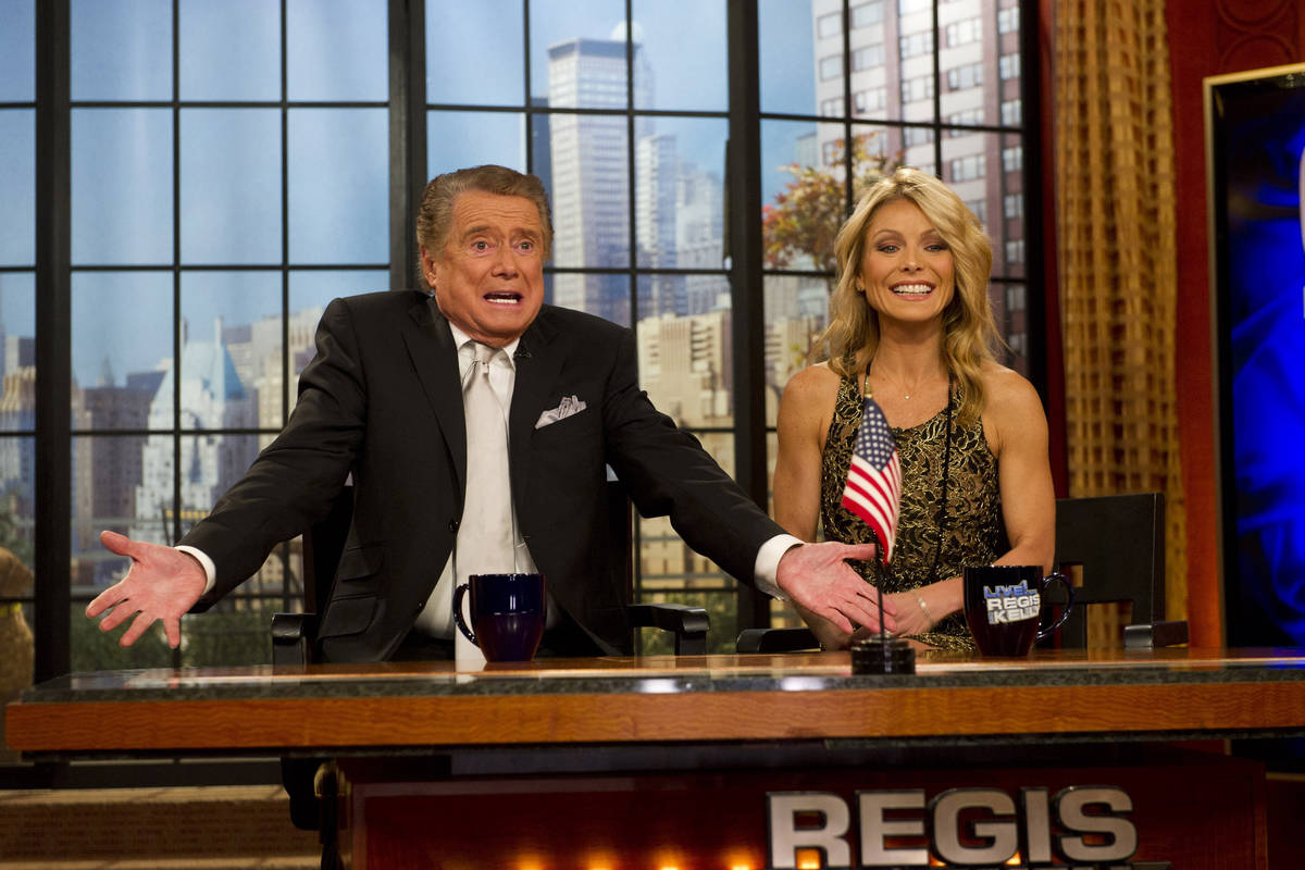FILE - In this Nov. 18, 2011 file photo, Regis Philbin and Kelly Ripa appear on Regis' farewell ...