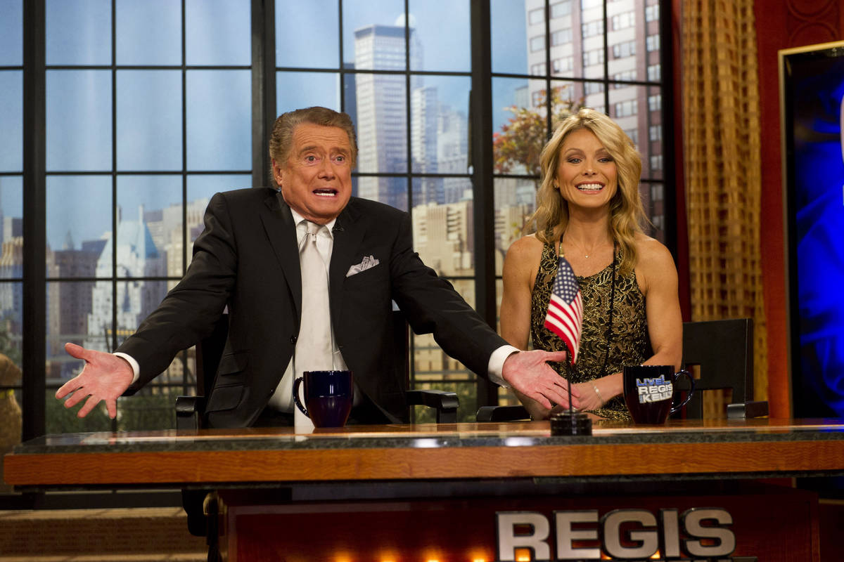 FILE - In this Nov. 18, 2011 file photo, Regis Philbin and Kelly Ripa appear on Regis' farewell ...
