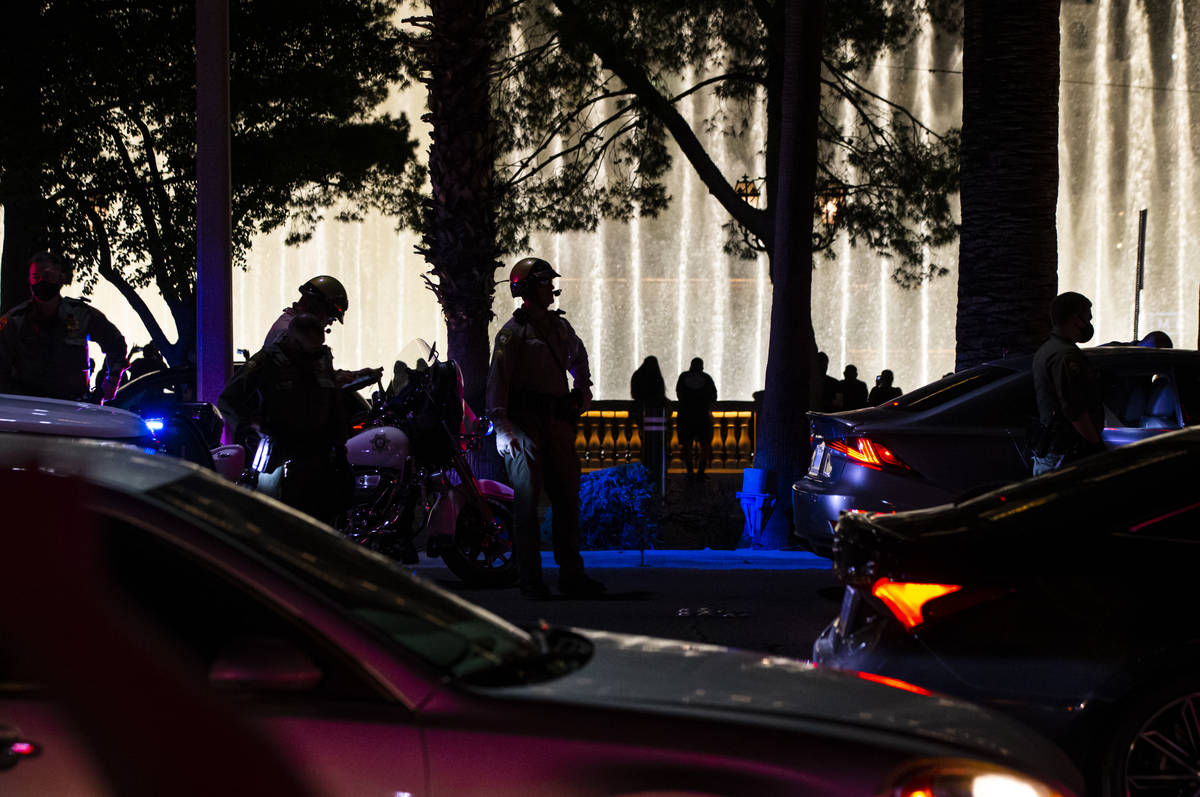 Las Vegas police stop a car that was assisting Black Lives Matter protesters near the Bellagio ...