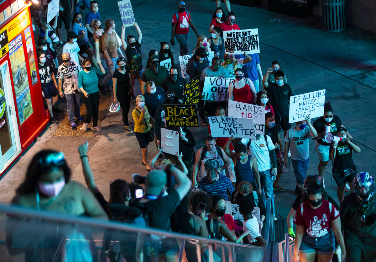 People march during a Black Lives Matter rally on the Las Vegas Strip on Saturday, July 25, 202 ...