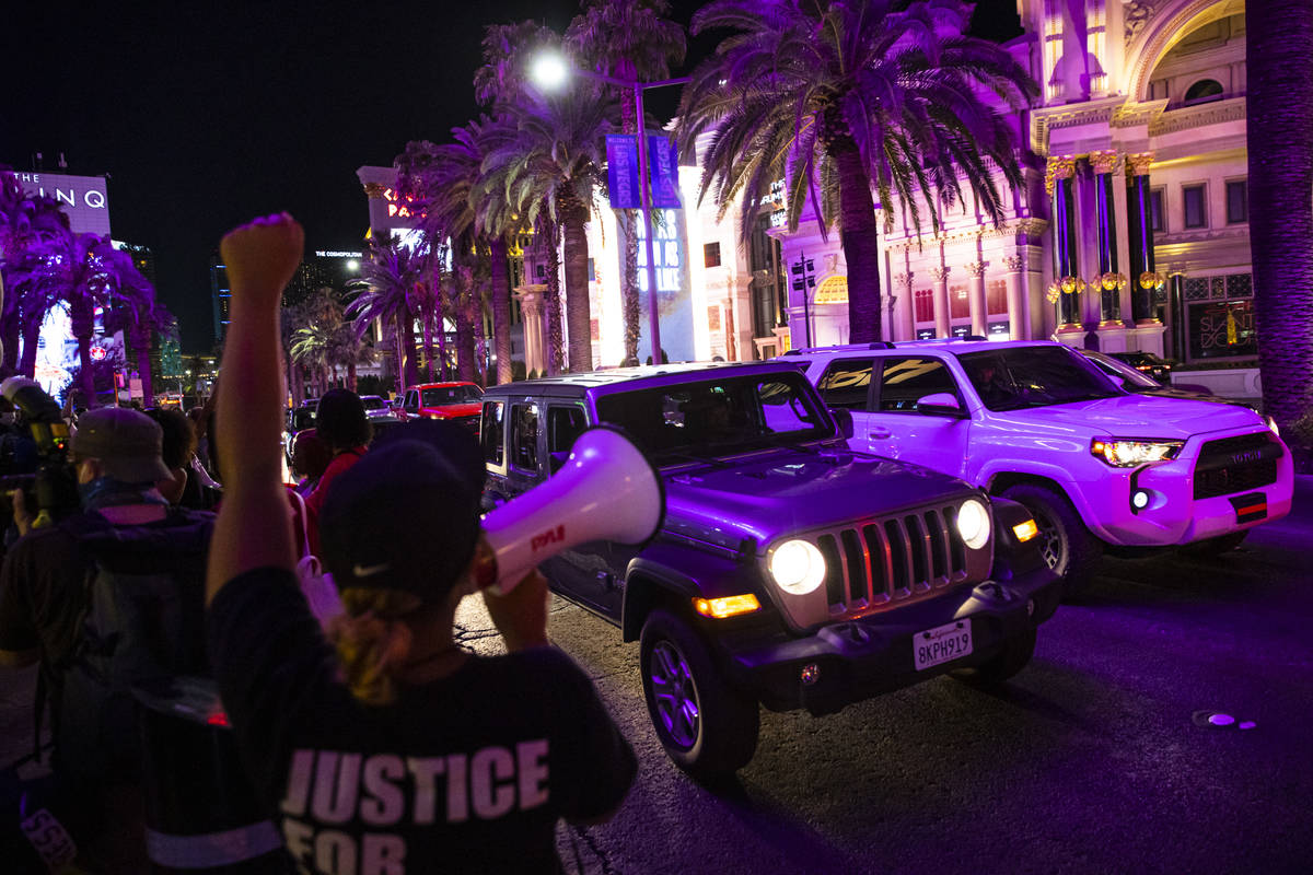 People march during a Black Lives Matter rally on the Las Vegas Strip on Saturday, July 25, 202 ...