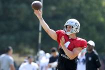 Oakland Raiders quarterback Derek Carr (4) throws the football during the NFL team's joint trai ...