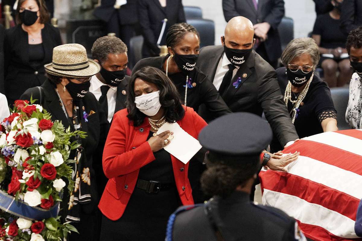 Rep. Terri Sewell, D-D-Ala., and other members of the Congressional Black Caucus, depart at the ...