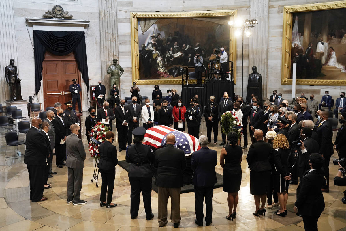 Members of the Congressional Black Caucus, say farewell at the conclusion of a service for the ...