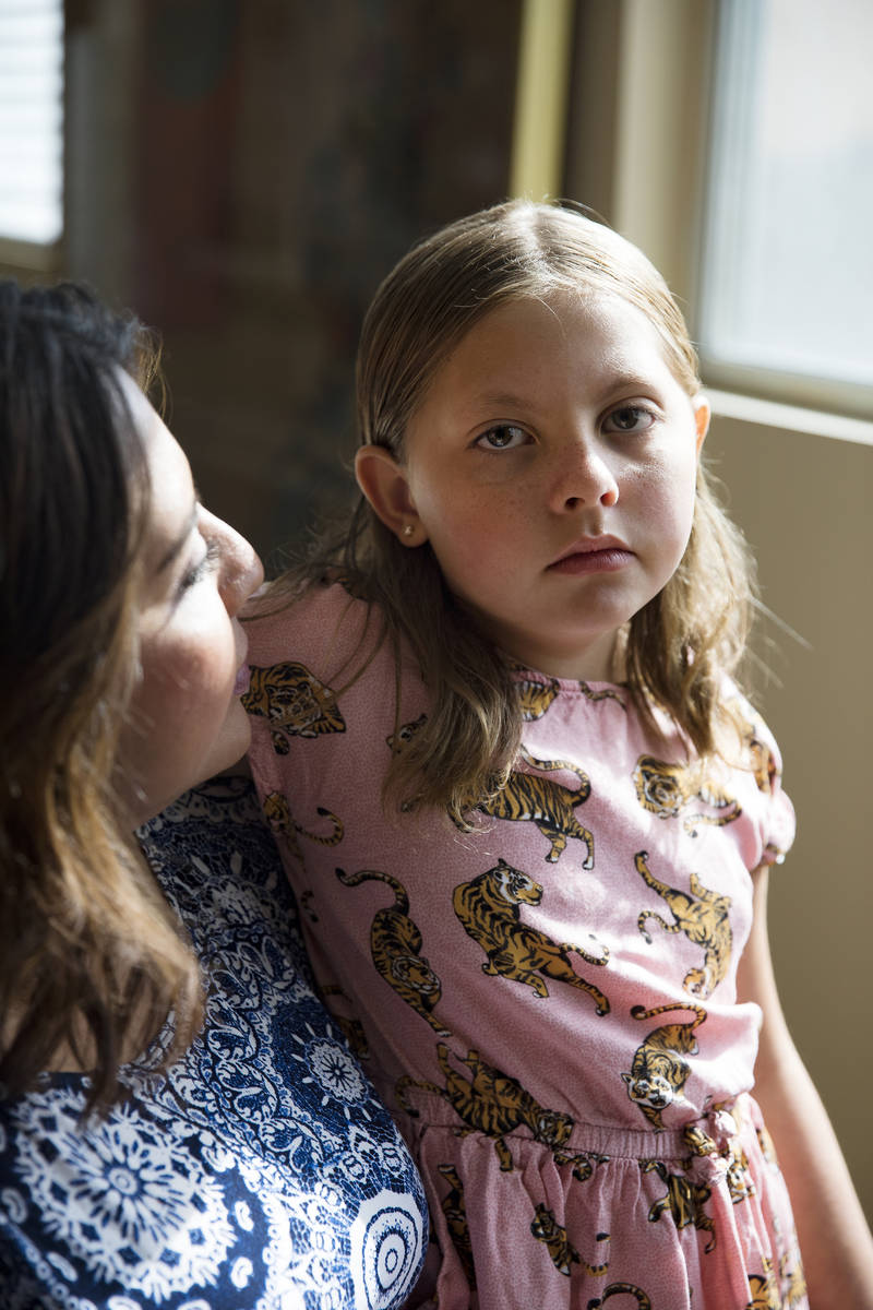 Adriana May-Azuero with her daughter Jaise May, 7, at their home in Las Vegas, Sunday, July 26, ...