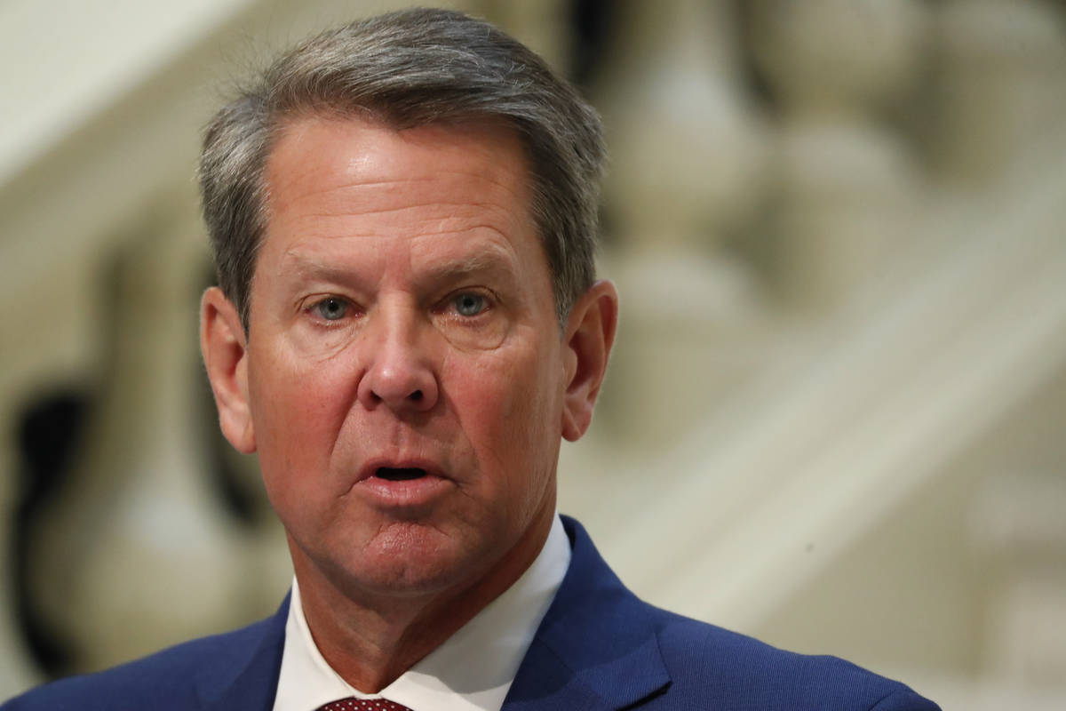 FILE-In this Friday, July 17, 2020 file photo, Georgia Gov. Brian Kemp speaks during a coronavi ...