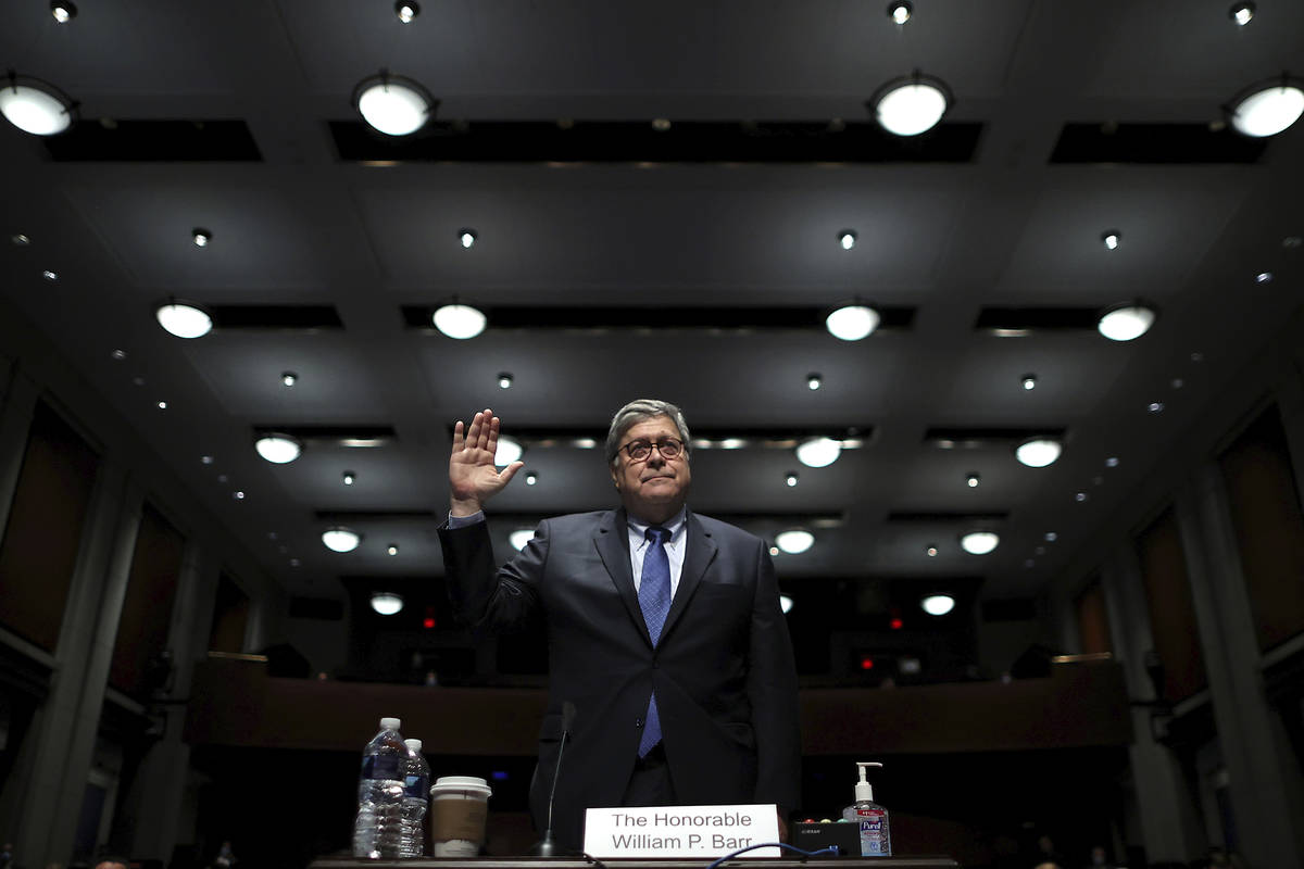 Attorney General William Barr is sworn in before testifying before a House Judiciary Committee ...