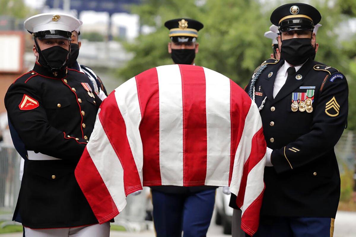 A military honor guard moved the casket of Rep. John Lewis into Ebenezer Baptist Church for his ...