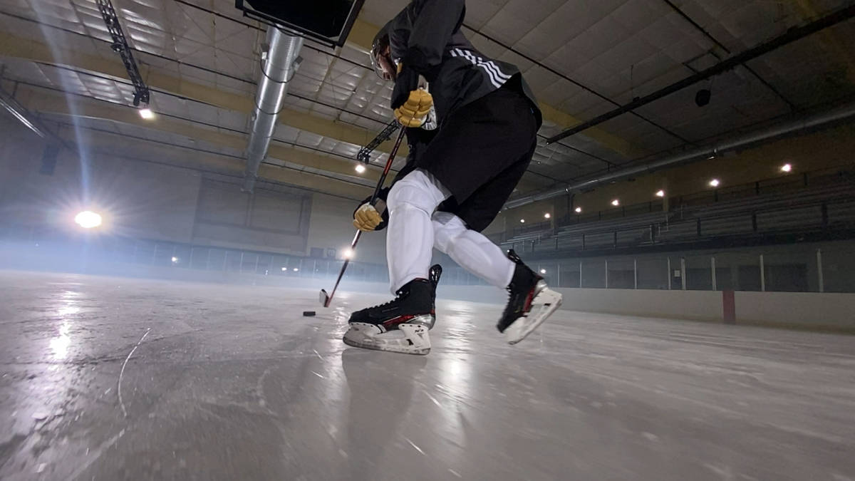 Golden Knights right wing Mark Stone stick handles a puck while filming an Apple commercial bef ...