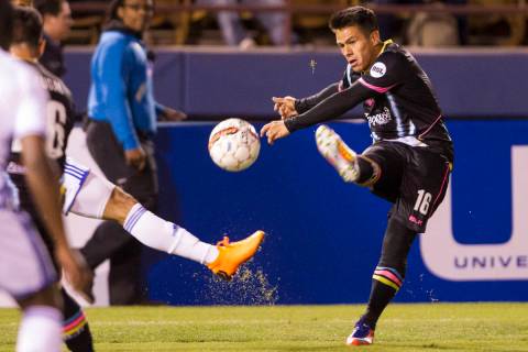 Las Vegas Lights FC’s Marcelo Alatorre (16) kicks a pass against Reno 1868 FC during the ...