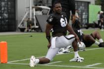 Former Las Vegas Raiders wide receiver Antonio Brown stretches during NFL football practice in ...