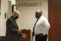 In this July 16, 2020, file photo, Assembly Speaker Jason Frierson, right, speaks with Assembly ...