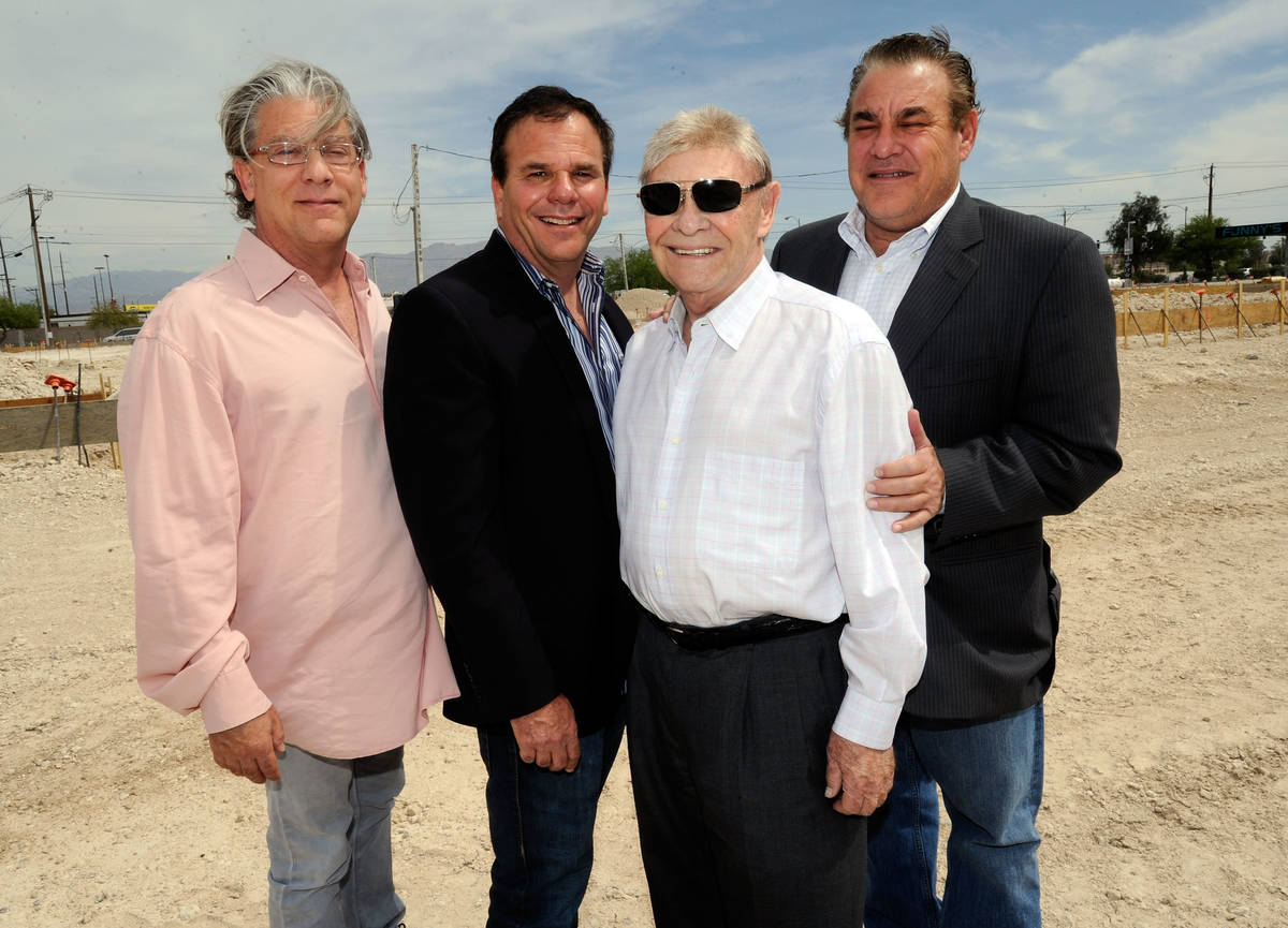 Developer Irwin Molasky, second from right, poses with his three sons, from left, Andrew Molask ...
