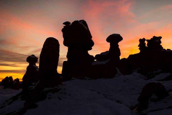 A dramatic sunset behind some of the thousands of hoodoos in Goblin Valley State Park. (L.E. Ba ...