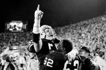 Raiders linebacker Matt Millen, left, who once slugged an opposing GM after a game, celebrates ...