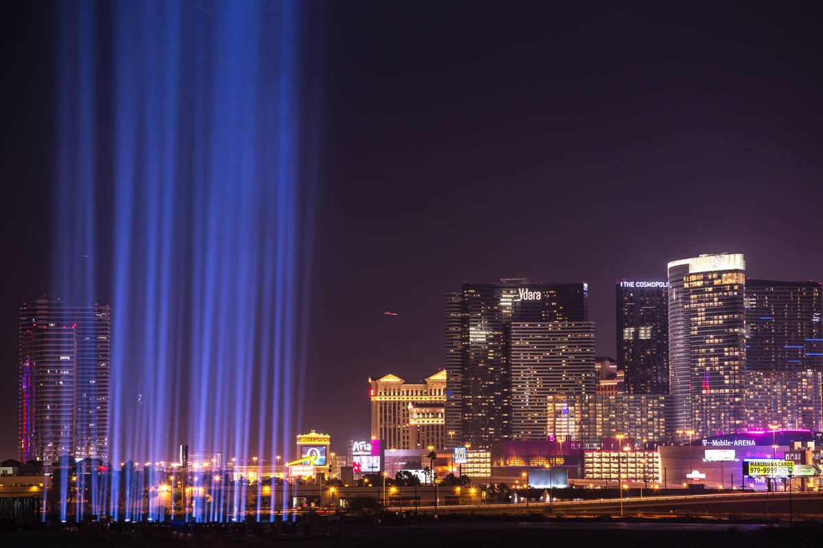 Lights are lit up at the construction site of the Raiders stadium in Las Vegas, Monday, Nov. 13 ...