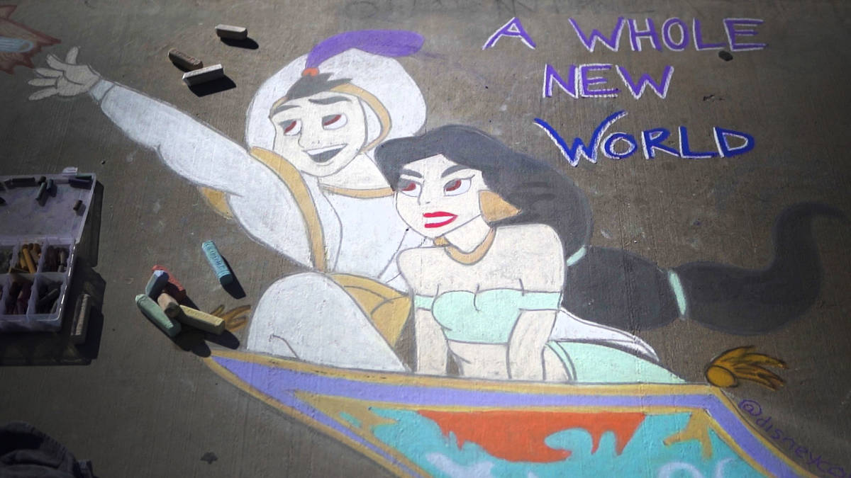 A public chalk drawing by Nicole Cox, of Las Vegas, called "A Whole New World" at Nevada Trails ...